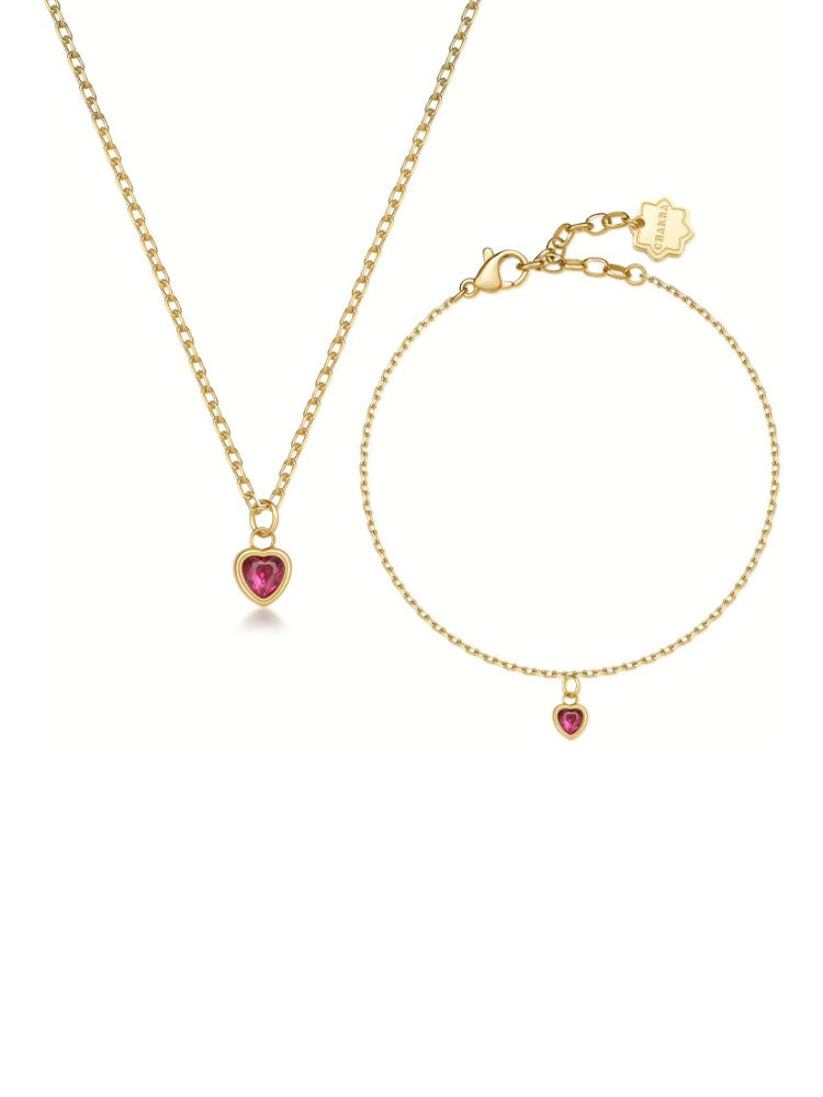 COLLANA E BRACCIALE DONNA CHAKRA IN ACCIAIO FINITURA ORO  CON PENDENTE A CUORE E CRISTALLO ROSSO  BROSWAY