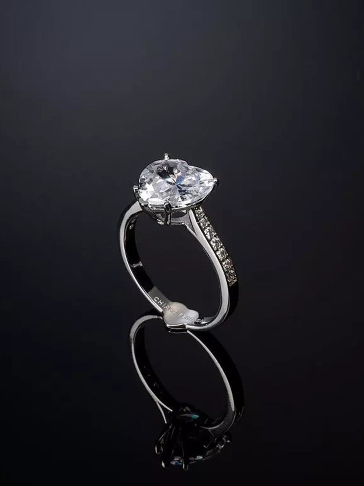 ANELLO DONNA FIRST LOVE, SOLITARIO IN ACCIAIO PLACCATO RODIO E ZIRCONE BIANCO A FORMA DI CUORE MIS 12 CHIARA FERRAGNI