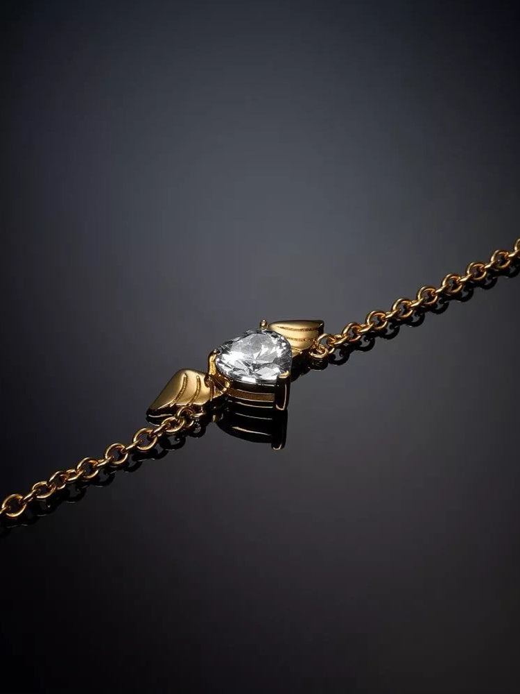BRACCIALE DONNA CUPIDO, IN ACCIAIO PLACCATO RODIO E ORO GIALLO 18 KT, ZIRCONIA E SIMBOLO ALI CHIARA FERRAGNI